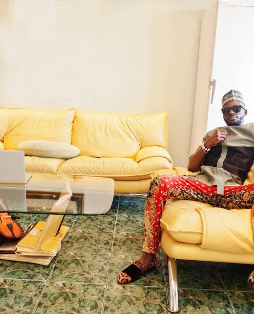 Rich african man at his appartment. Portrait of successful black man indoor.